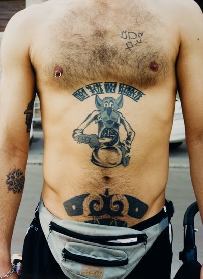 Tattoo says: My honor, My loyalty