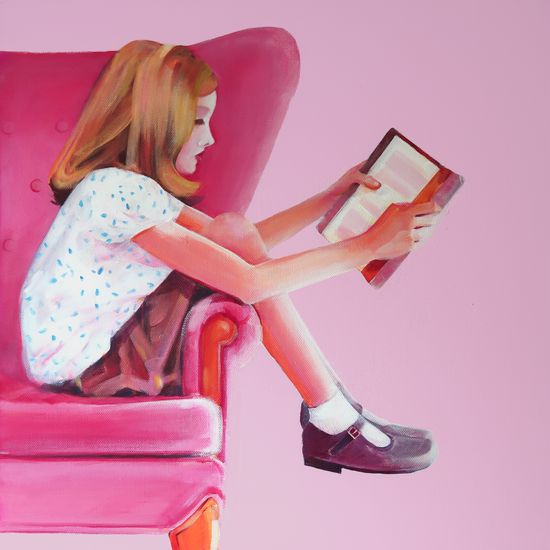 Girl in pink armchair